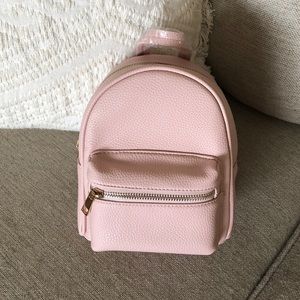 Brand new small pink backpack